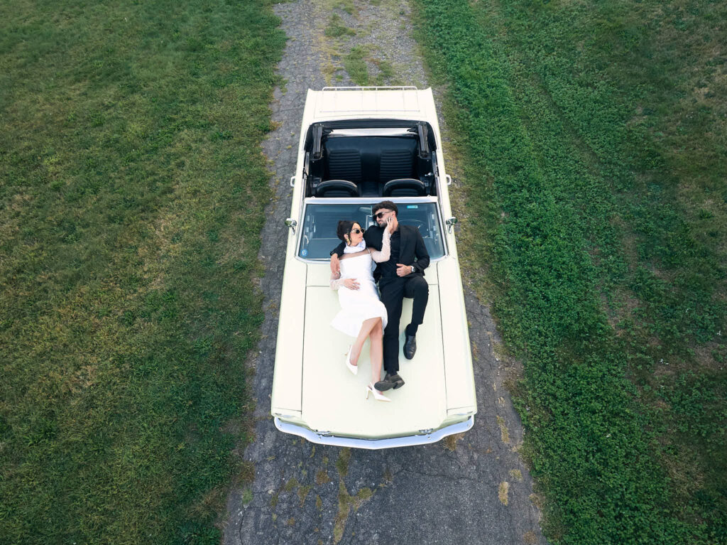 Aldrich Mansion engagement photographer captures couple with vintage car