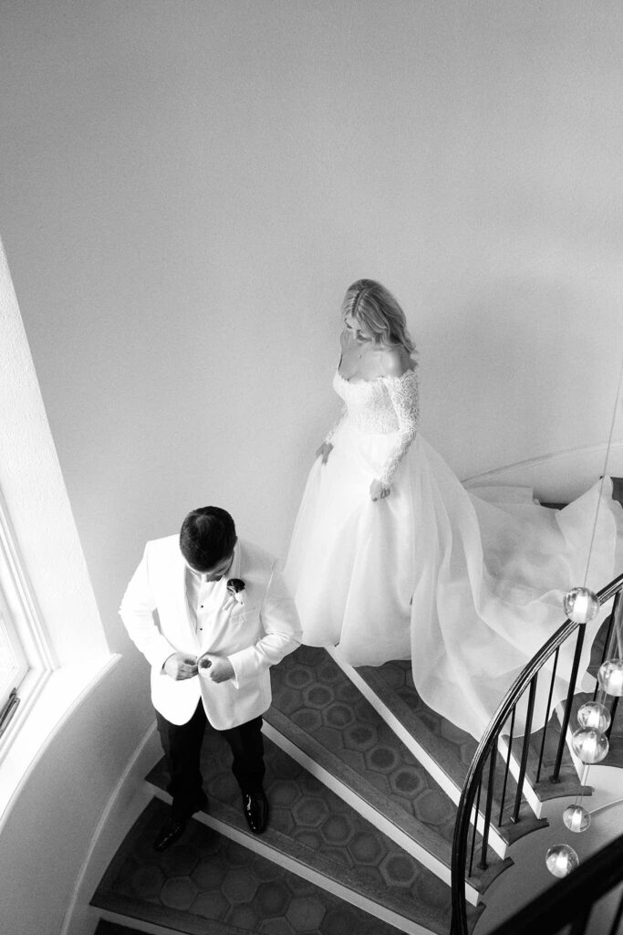 Bride and groom on the stairs in Rhode Island at Shepherd's Run