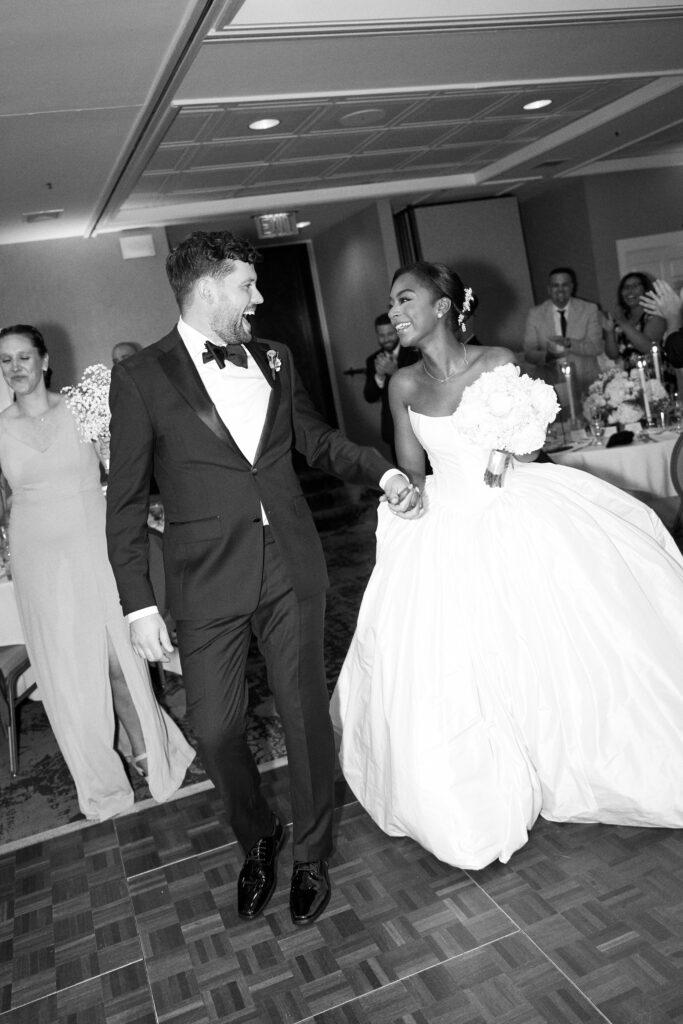 Bride and groom enter their Westbrook wedding reception
