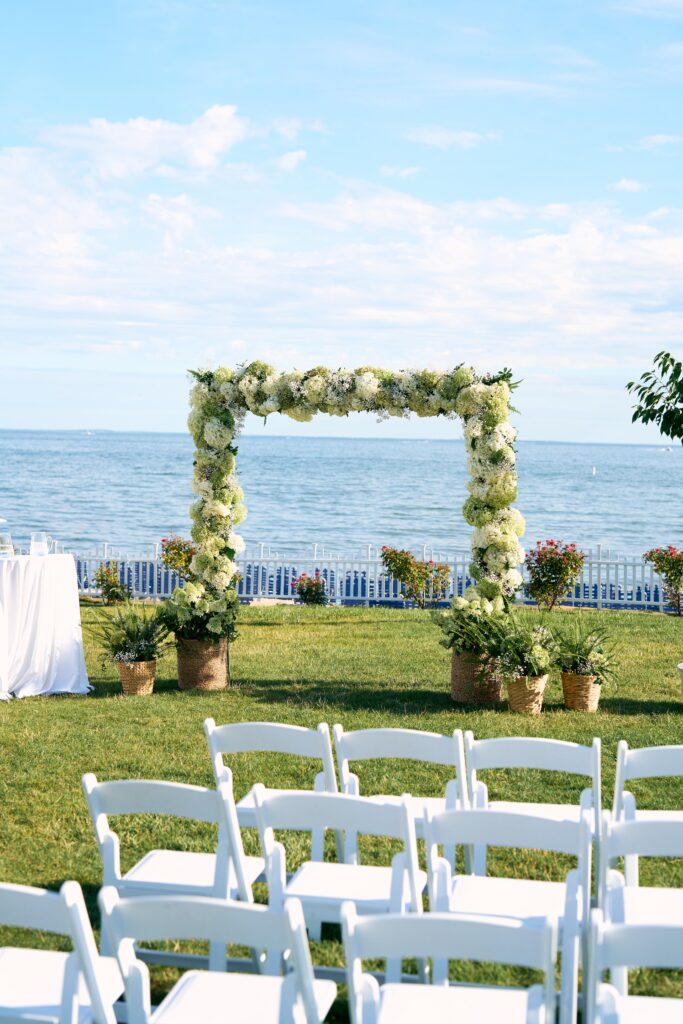Floral ceremony arch at Water's Edge in Connecticut