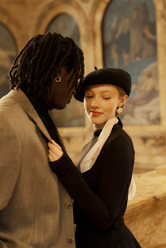 Indoor engagement photos on the grand staircase at Boston Public Library