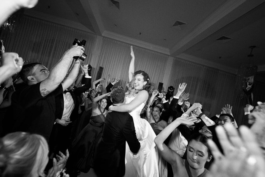 Bride and groom on the dance floor at their Newport wedding reception at Belle Mer