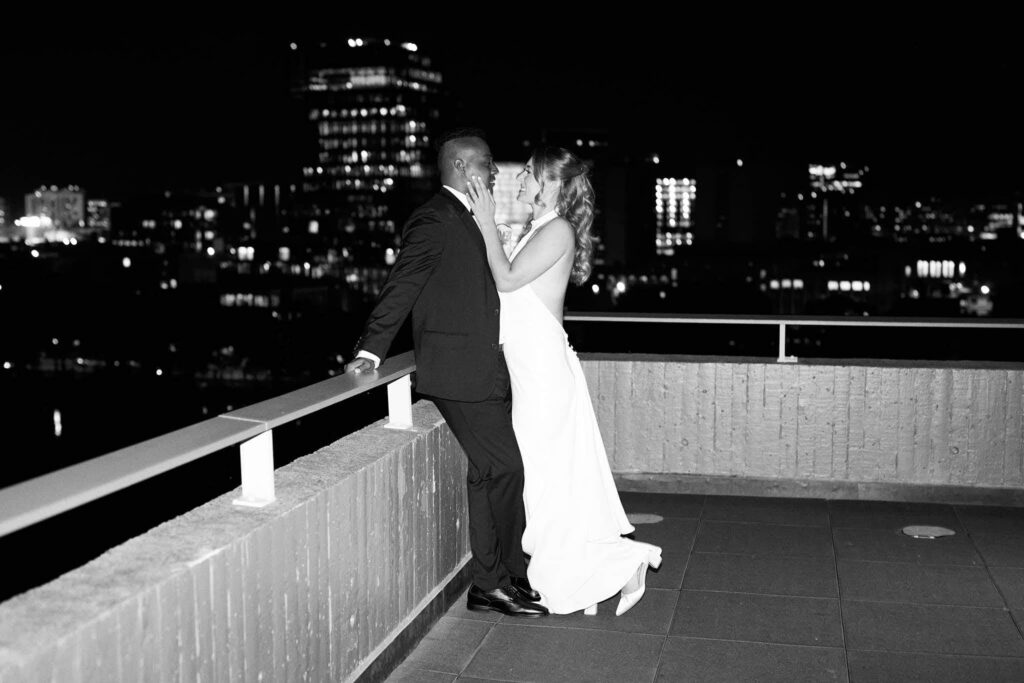 Rooftop bride and groom photo by Boston wedding photographer