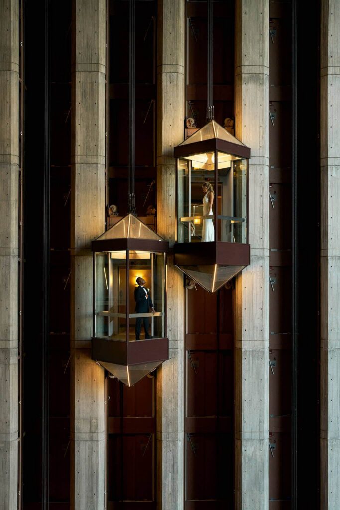Boston wedding photography at Hyatt Regency Cambridge in the glass elevators