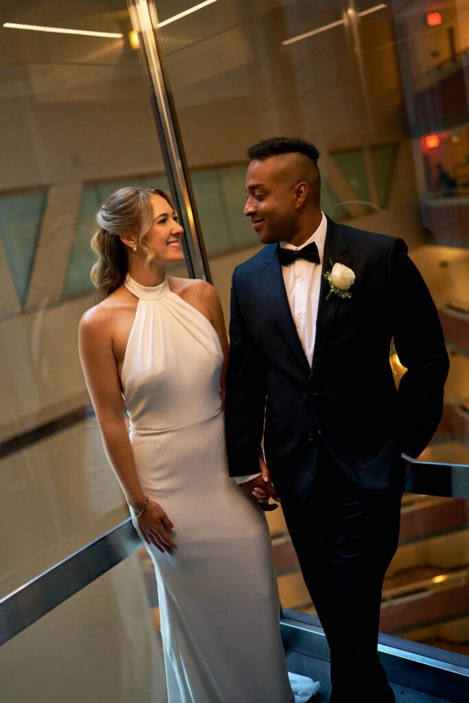 Glass elevator portrait of bride and groom at Hyatt Regency in Boston