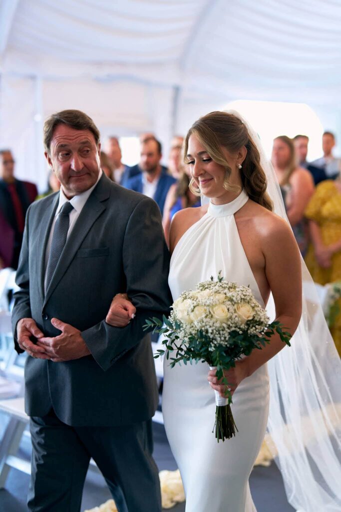 Bride walks down the aisle at Boston wedding ceremony